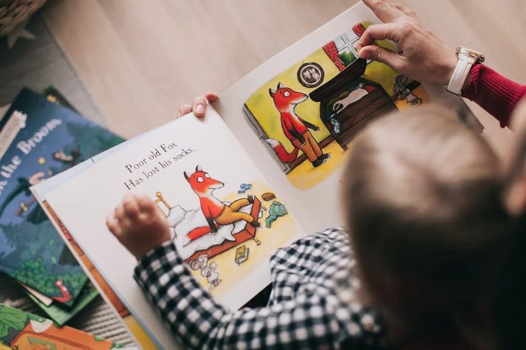 An image of a kid with a book