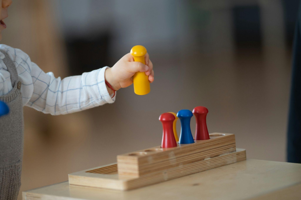 A child learning with Montessori toys